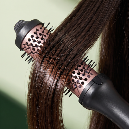Close-up of Tailwind Blowout Brush gliding through hair